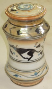 albarello (pharmacy jar) with hound and oak leaf decoration; 7.5-9” tall. 